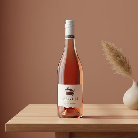 Bottle of rose wine from Cocoa Hill on a white background